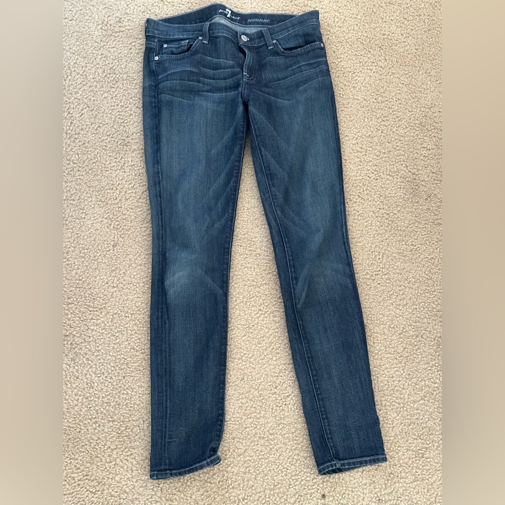 7 Jeans- low rise. Blue rhinestones on the back pockets